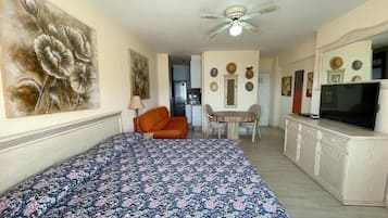 Studio, Balcony, Sea View | Living area | Flat-screen TV