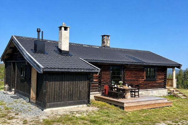 Traditional log cabin in mountain top