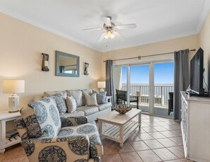 Living Area - Balcony Access - Crystal Towers #1304 | Gulf View + Lazy River and Pools (Gulf Shores)
