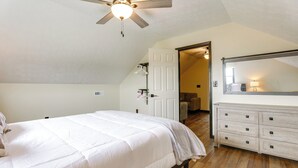 A bedroom with a bed, dresser, and a ceiling fan. - Game Room & Countryside Views! Salvisa Family Gem (Salvisa)