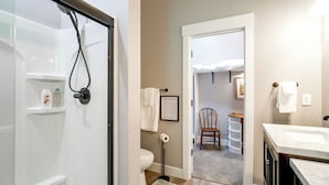 A bathroom with a shower, toilet, and sink. - Near Parks & Dtwn Clarinda! 'house of Stroburg' (Clarinda)