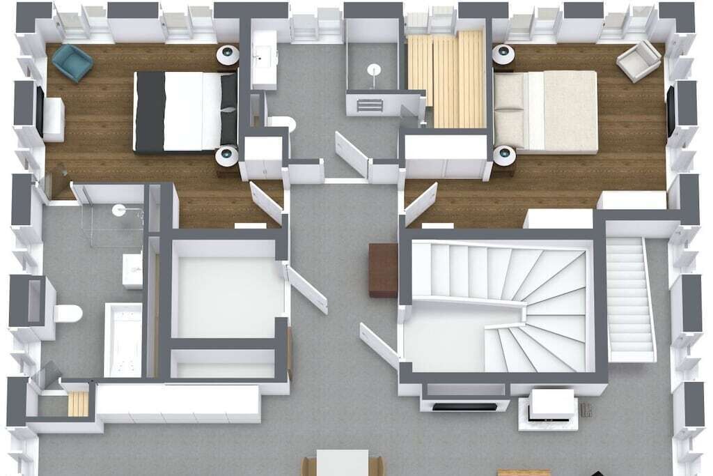 Ein Grundriss eines Hotels mit mehreren Schlafzimmern, Bädern und einem zentralen Wohnbereich.