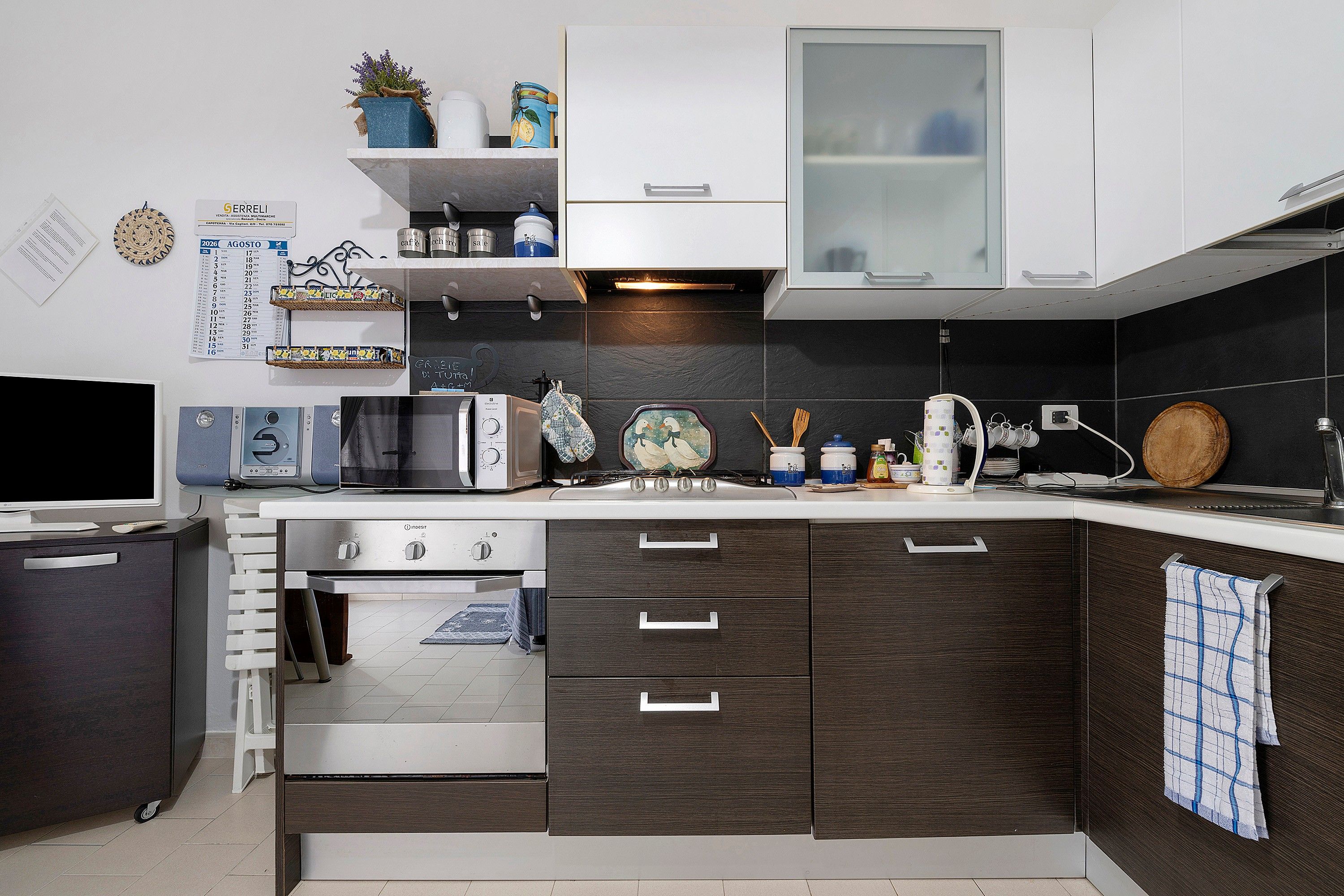 Coffee/tea maker, fridge, microwave, oven