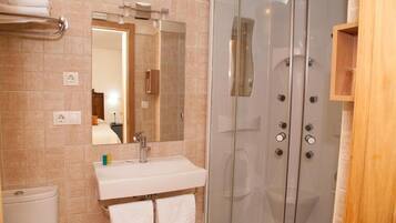 Hair dryer, towels, soap, shampoo