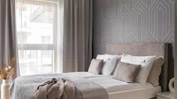 Deluxe Apartment, Balcony, Courtyard View | Premium bedding, iron/ironing board, cribs (surcharge), WiFi (free)