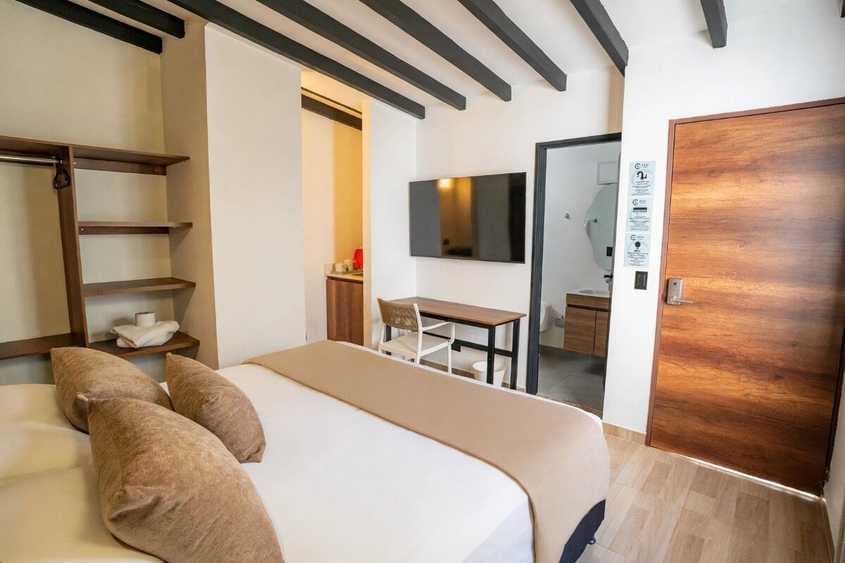 Habitació Deluxe | Escriptori, wifi gratuïta i roba de llit 