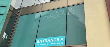 A building facade with the sign 'Royal Derngate &' and 'Entrance A' indicating the location of the entrance.