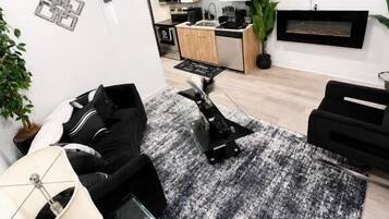Apartamento, vista para a cidade | Área de estar