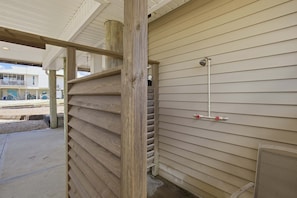 A covered outdoor area with wooden beams and a metal structure, possibly a patio or deck. - Seascape St. George Island (Saint George Island)