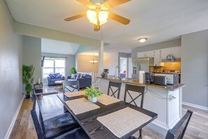 A modern kitchen with a built-in oven, a refrigerator, and a coffee maker. - 11 Mi to Overland Park: Olathe Mid-Term Stay (Olathe)