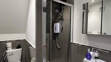 Hair dryer, towels, soap, toilet paper