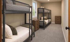 A room with bunk beds, a window, and a small wooden cabinet. - Silver Sands Beach Escape Hot Tub & Pontoon (Wautoma)