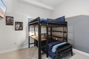 A bunk bed with a desk underneath in a room with white walls and a window. - The Golden Hour - Elevator & Main Channel Views! (Osage Beach)