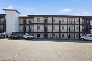 A multi-story parking garage with several cars parked. - The Golden Hour - Elevator & Main Channel Views! (Osage Beach)