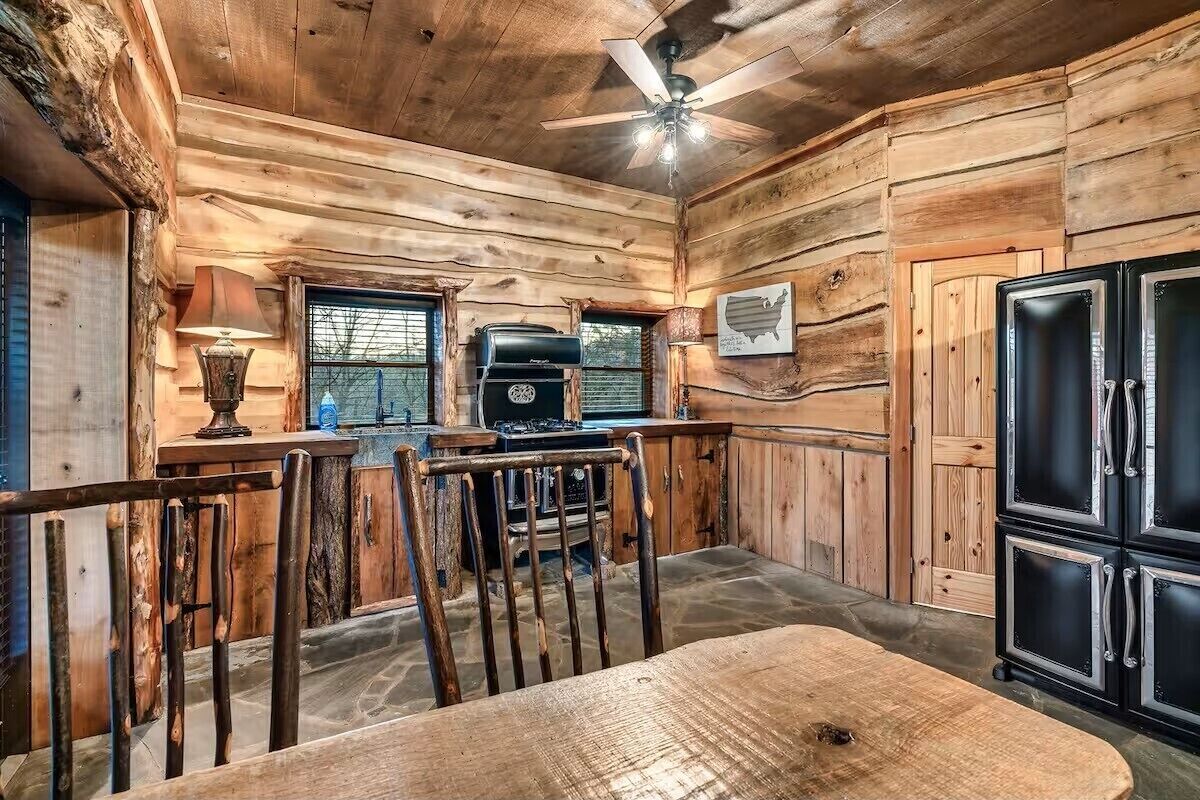 Rustic cabin dining nook with warm wood finishes and cozy gathering space
