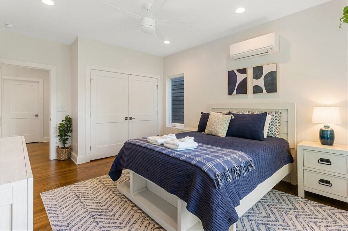 Bedroom 3 with a queen bed and storage