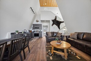 Open living, dining, and kitchen areas - Hunters Ridge | Rustic Modern • Hot Tub • Goats! (Rossville)