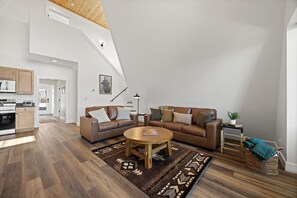 Main living room beneath the A-frame ceiling - Buffalo Bluff | A-Frame Retreat | Pet Baby Goats! (Rossville)