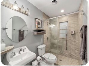 Shower, hair dryer, towels, soap