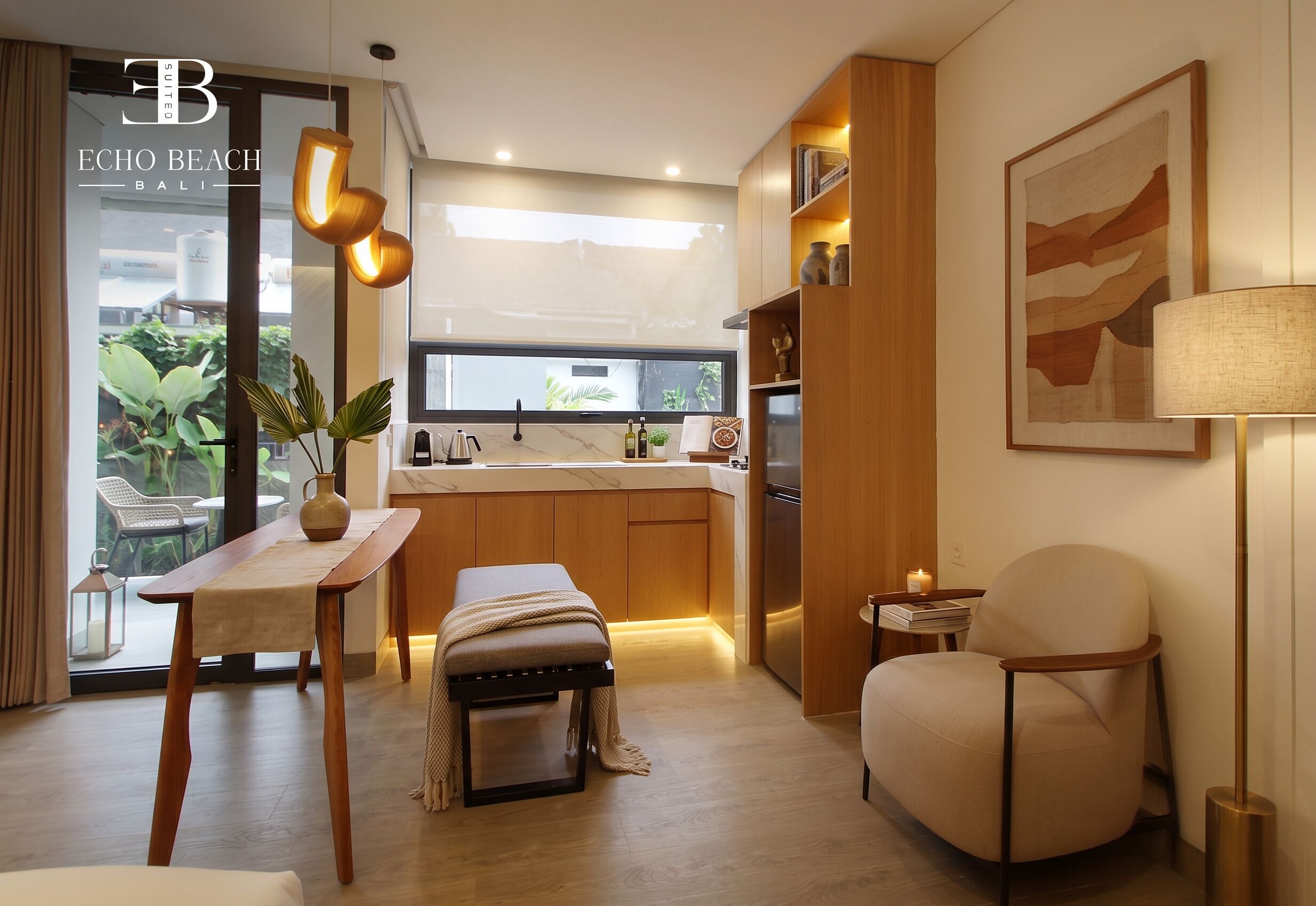 A modern kitchen with a built-in oven and a dining area with a bench and table.