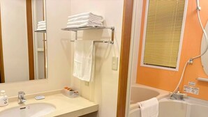 A bathroom with a sink, mirror, towel rack, and shower area. - Hanatsuki・Kakure Onsen Resort Villa Hotel (Izu Kogen) (伊東市)