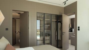Un dormitorio moderno con cama, vestidor y vistas al exterior.