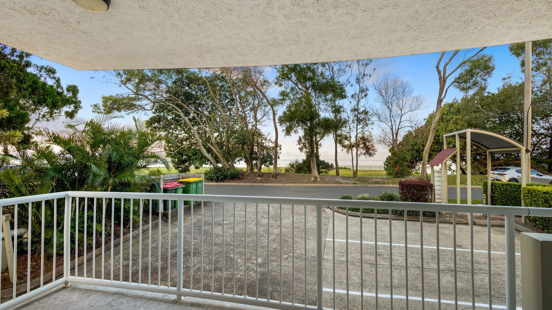 Relax and enjoy the leafy outlook to the beach