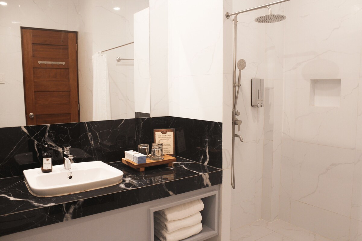 Shower, towels, soap, shampoo