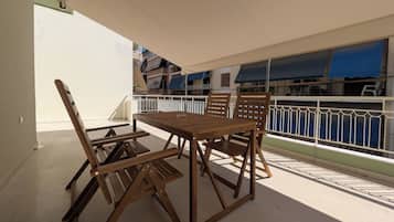 Family Apartment, Balcony, City View | Outdoor dining