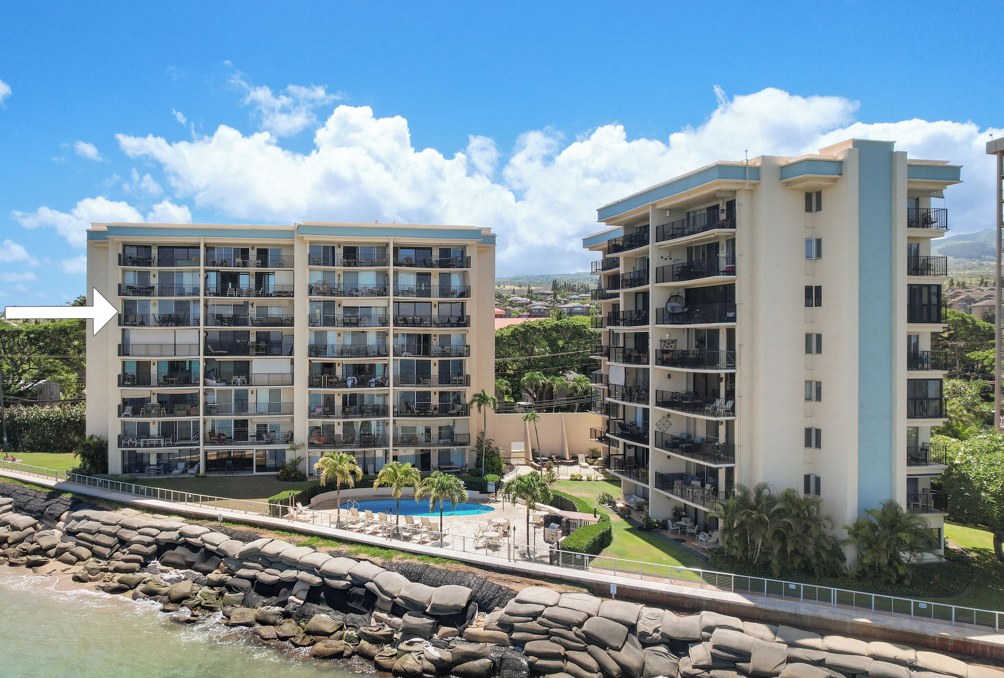 An exterior view highlighting the position of unit A604 on the 6th floor of the Hololani Resort building