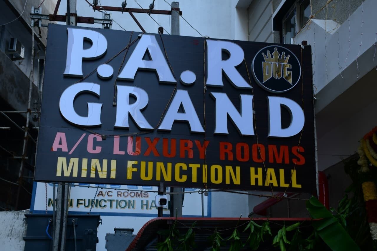 A sign for P.A.R. GRAND A/C LUXURY ROOMS MINI FUNCTION HALL.