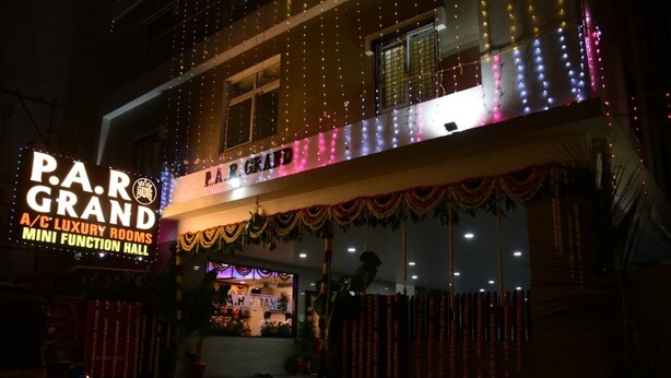 A building with a sign for 'P.A.R. GRAND A/C LUXURY ROOMS MINI FUNCTION HALL'. - P A R GRAND LUXURY HOTEL  (ANANTHAPURAMU)