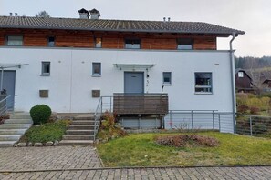 A modern two-story building with a flat roof, a front entrance, and a small porch area. - Ketterer Hinterzarten Black Forest (Hinterzarten)