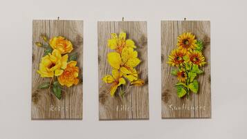 Three vertical panels with floral artwork.