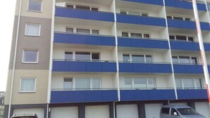 A multi-story building with balconies and windows. - 14 in the Quisisana house (Westerland)