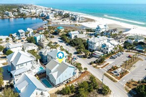 A coastal residential area with houses, a beach, and a body of water. - KULULA- Sleeps 19, 6 BR 5 BA, private pool, bikes & beach (Santa Rosa Beach)