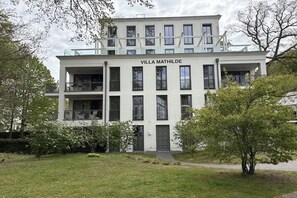 A multi-story building named 'Villa Mathilde' with a symmetrical facade, multiple windows, and a balcony on the upper floor. - Holiday apartment in Binz with swimming pool (Binz)