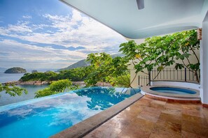 A swimming pool with a view of the sea and mountains. - Amazing View to los Arcos -4 Bedroom Villa (Puerto Vallarta)