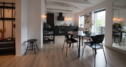 Bright Central Top-Floor Apartment with Balcony