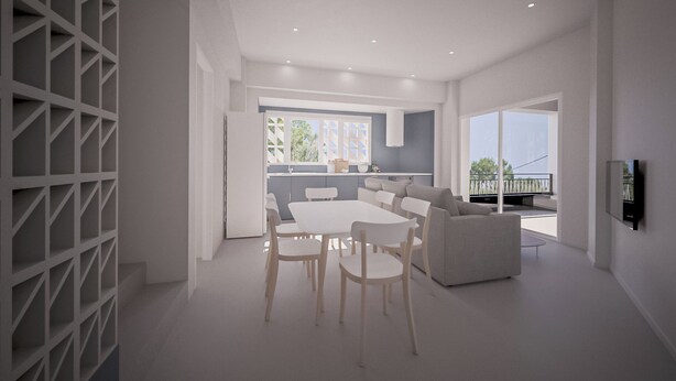 Un interior moderno con comedor, sofá y cocina visible a través de un ventanal.
