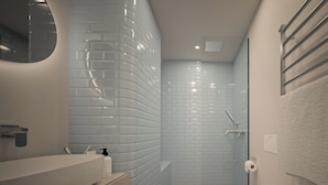 Ein modernes Badezimmer mit einem runden Waschbecken, einer Toilette und einer Duschkabine.