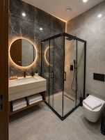 Shower, hair dryer, slippers, towels