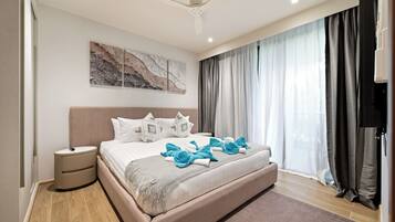 Deluxe appartement, 3 slaapkamers | Een kluis op de kamer, een strijkplank/strijkijzer, gratis babybedden