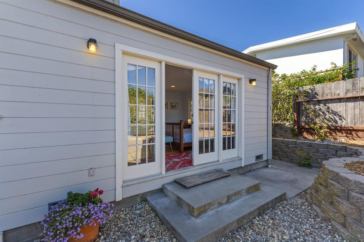 In Bedroom #1, French Doors Lead to the Backyard