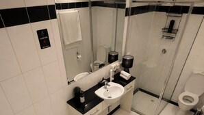 Studiosuite, Stadtblick | Badezimmer