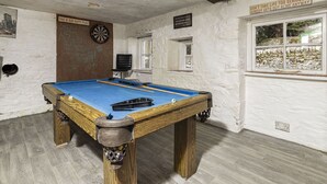 A room with a pool table, a dartboard, and a window with a view. - Stunning  villa for 4 guests with pets allowed (Isle Of Bute)