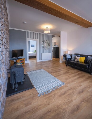 Cosy former converted bank in heart of a busy working fishing village.