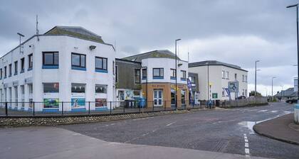 Cosy former converted bank in heart of a busy working fishing village.