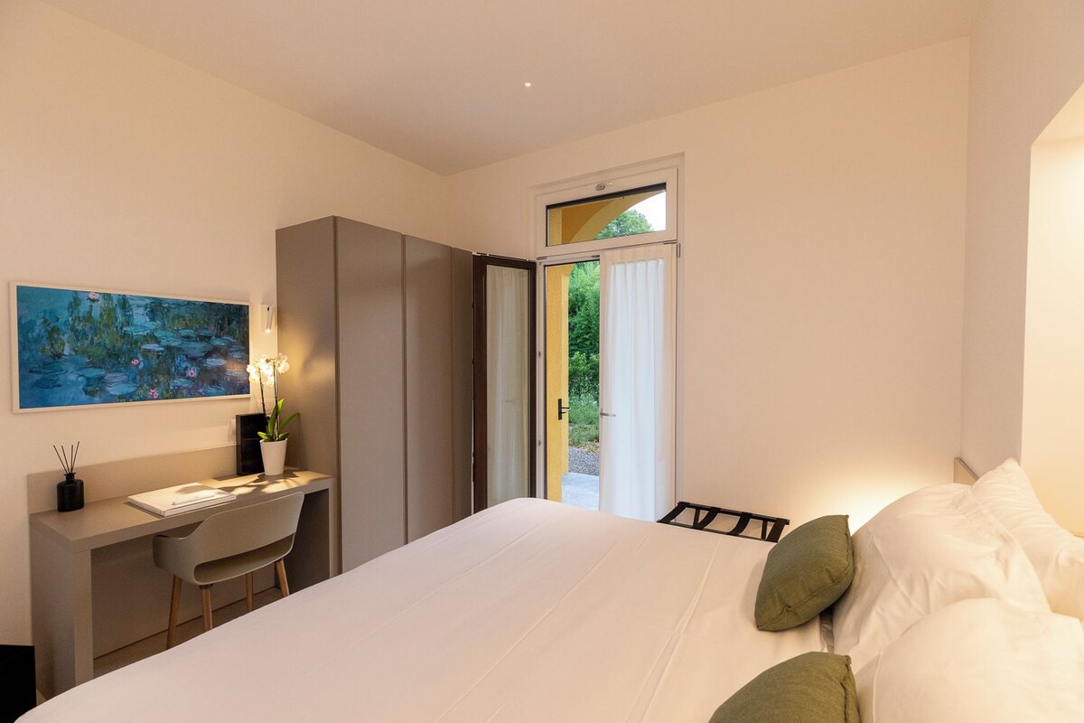 Deluxe Double or Twin Room, Garden View (living and kitchen shared) | In-room safe, desk, laptop workspace, free WiFi