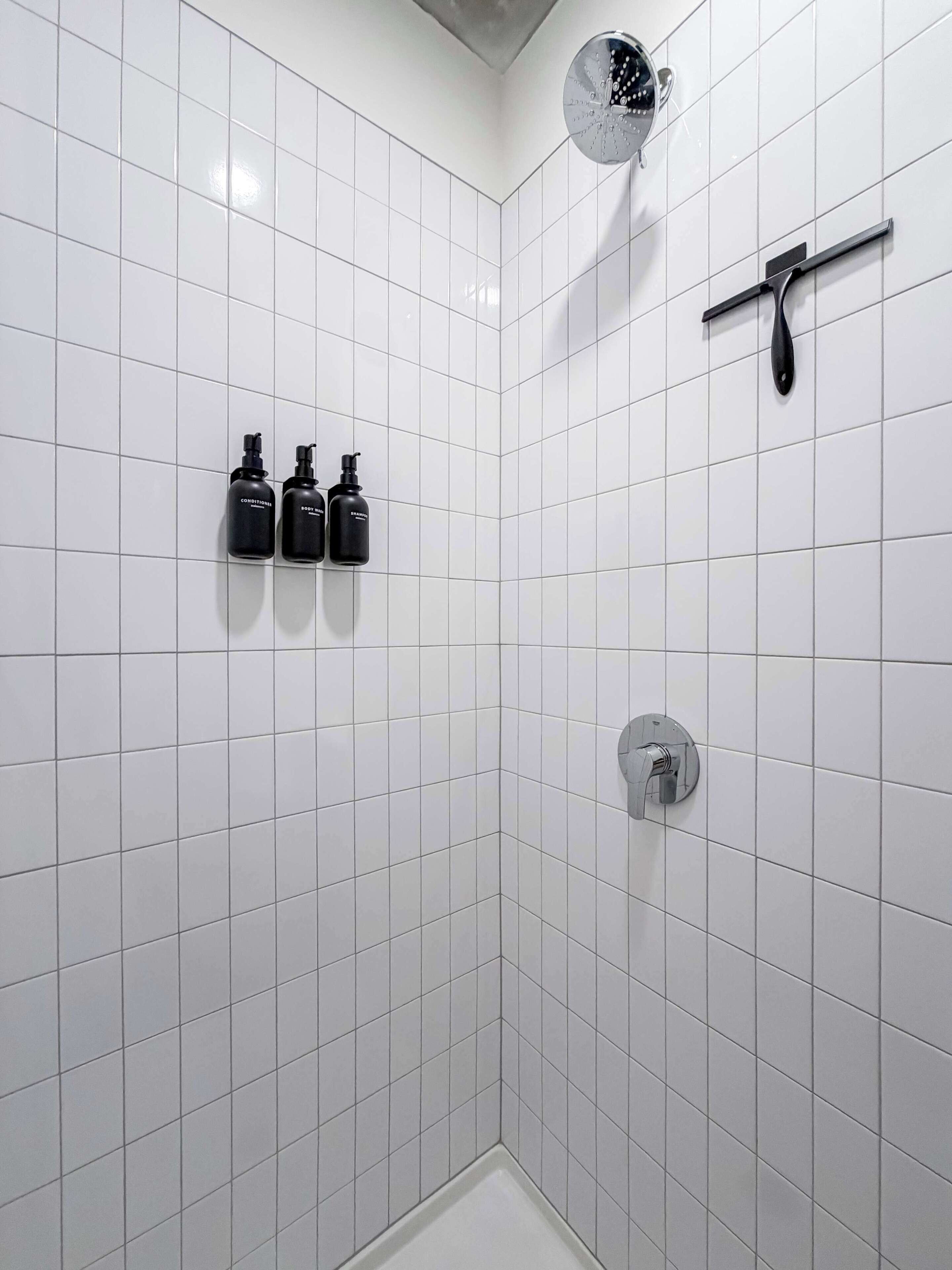 Shower, hair dryer, towels, shampoo